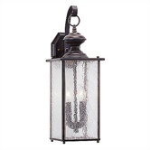 Sheppard  Outdoor Wall Lantern in Textured Rust Patina