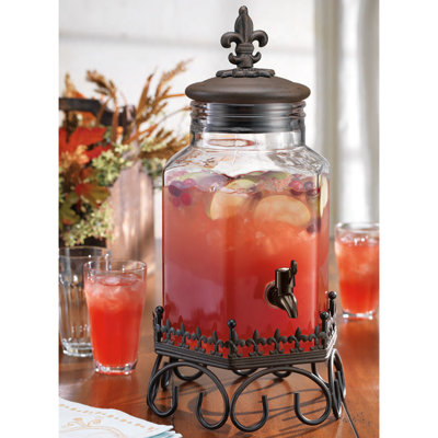 Drink Dispenser with Fleur De Lis Top on Scroll Stand
